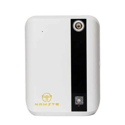 White electronic device with black accent and 'Namste' branding on a white background | Origin Zero