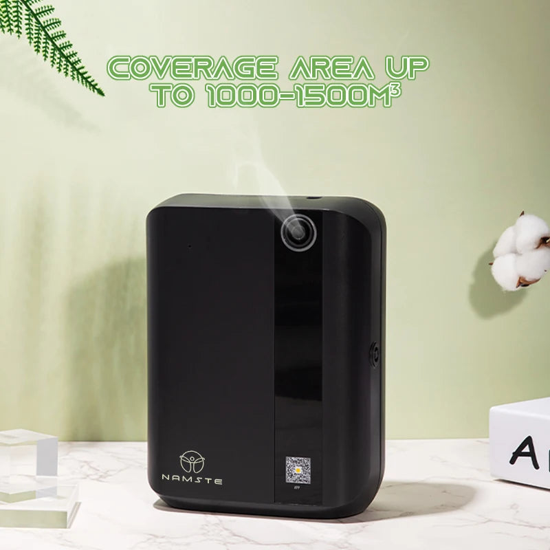 Black air purifier with 'NAMSTE' branding on a light green background | Origin Zero