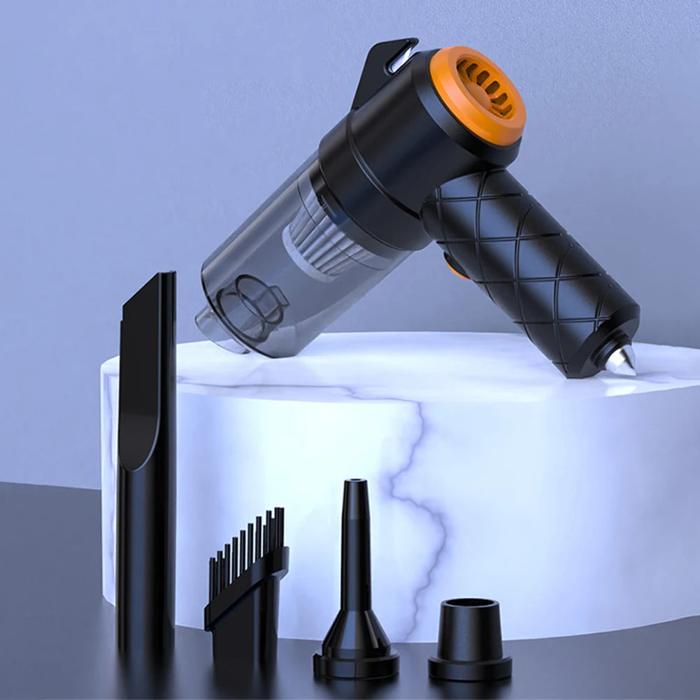 Black handheld vacuum cleaner with attachments on a light gray  | Origin Zerobackground