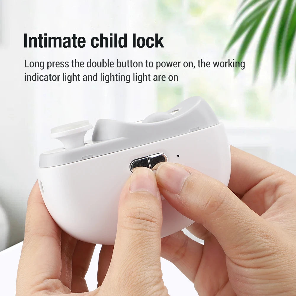 White electronic device with a power button being pressed, against a blurred indoor background. | Origin Zero